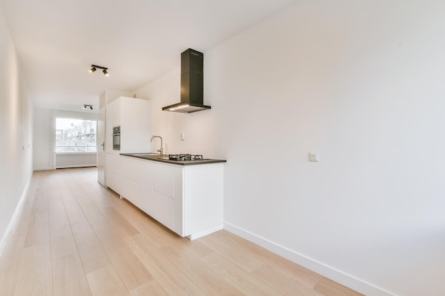 Pretty kitchen with hardwood parquet flooring