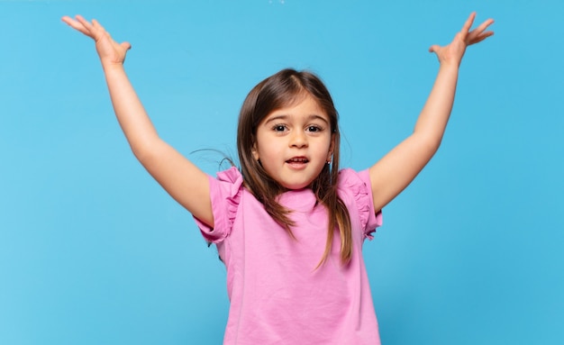 Pretty little girl celebrating successful a victory