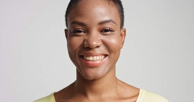 Pretty mixed race woman with short hair laughing