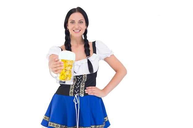 Pretty oktoberfest girl holding beer tankard