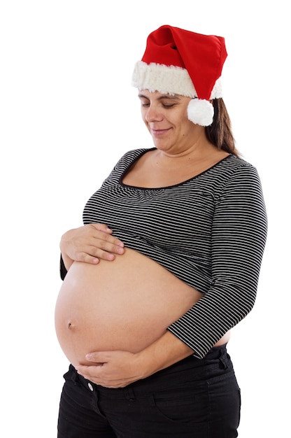 Pretty pregnant woman with Santa Claus hat