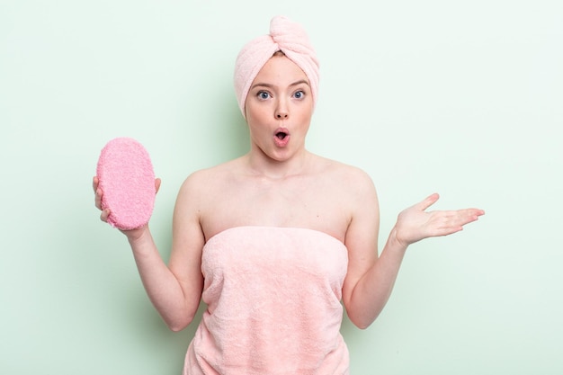 Pretty redhead woman having a shower concept