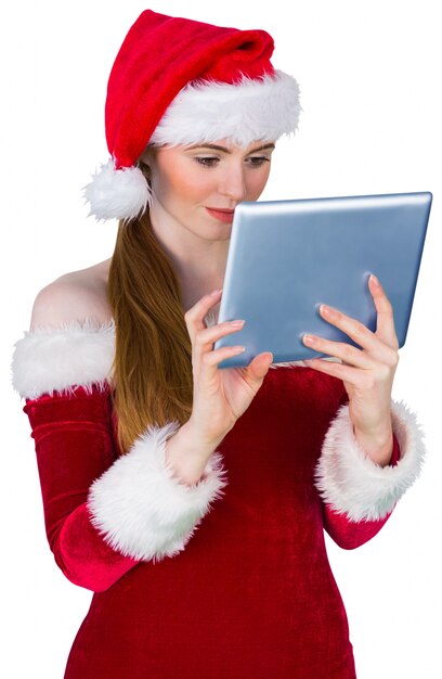 Pretty santa girl using tablet pc