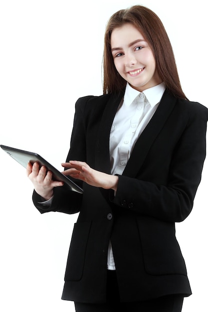 Pretty schoolgirl holding newly launched tablet pc