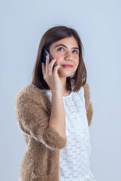 Pretty teenage girl with mobile phone