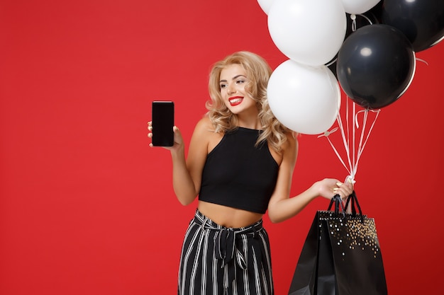 Pretty woman in black clothes posing 