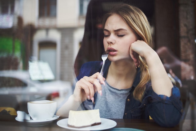 Pretty woman in cafe eating vacation lifestyle