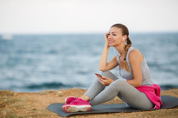 pretty woman doing yoga fitness outdoor