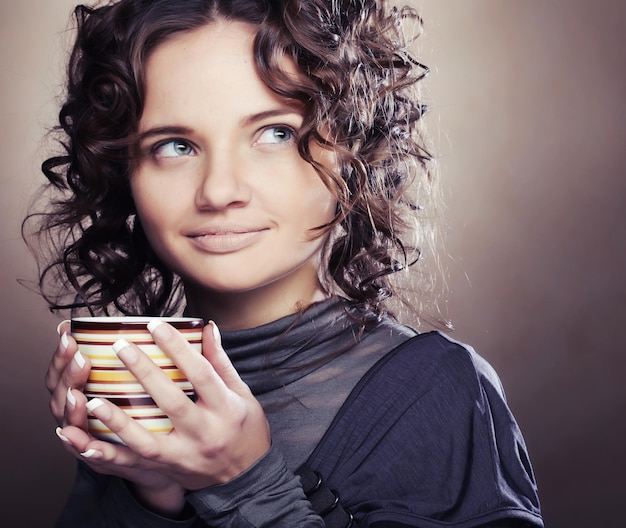 Pretty woman drinking coffee