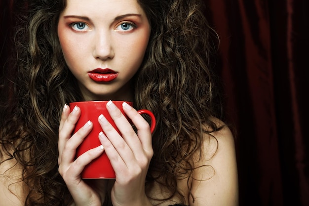 Pretty woman drinking coffee