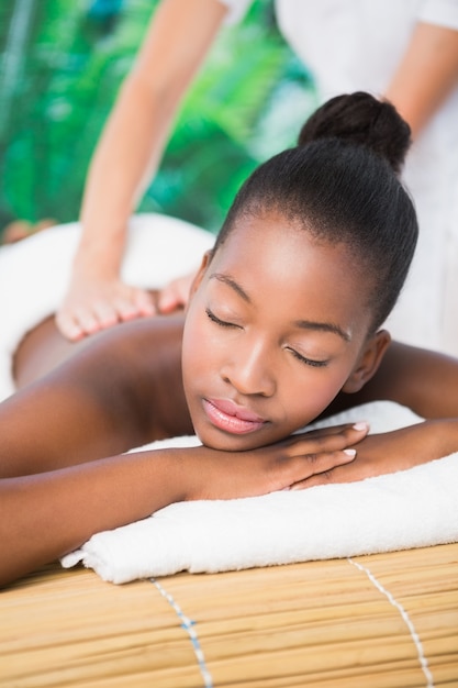 Pretty woman enjoying a back massage