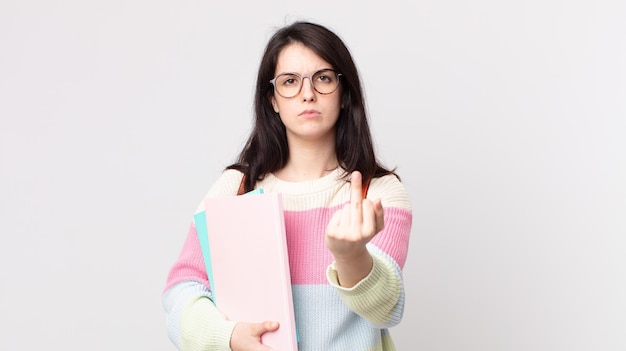 Pretty woman feeling angry, annoyed, rebellious and aggressive. university student concept