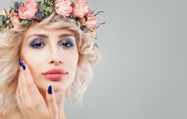 Pretty Woman in Flowers Wreath, Portrait