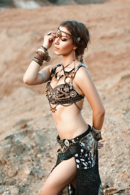Pretty woman in an Indian tribal jewelry