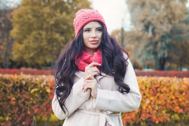 Pretty woman outdoors Beautiful girl in fall park