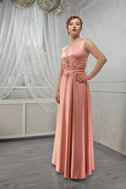  pretty woman in peach long dress