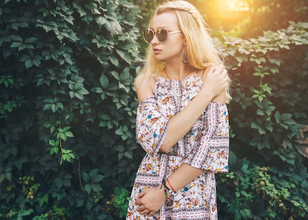 Pretty woman posing in bush