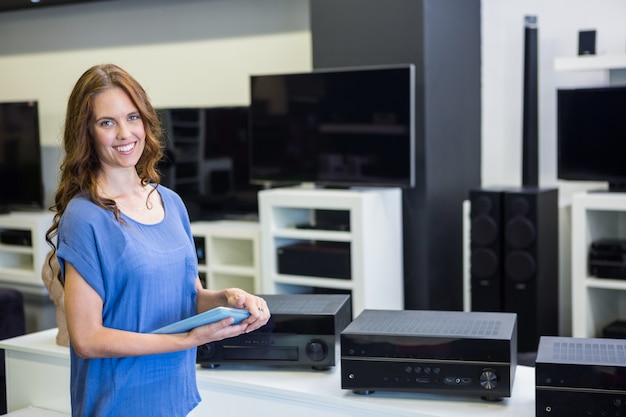 Pretty woman shopping for new electronics