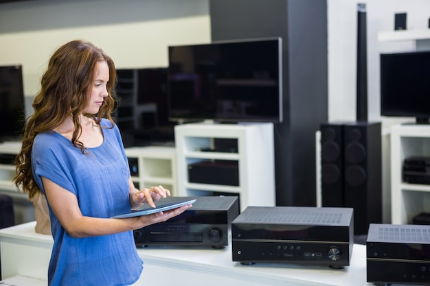 Pretty woman shopping for new electronics