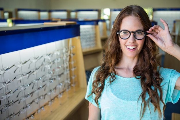 Pretty woman shopping for new glasses