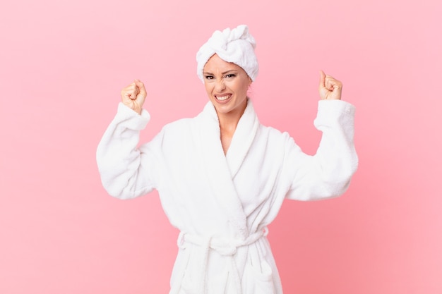 Pretty woman shouting aggressively with an angry expression. spa concept