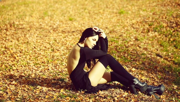 Pretty woman sitting outdoors