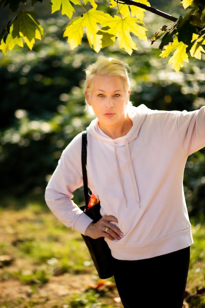 Pretty woman under a tree