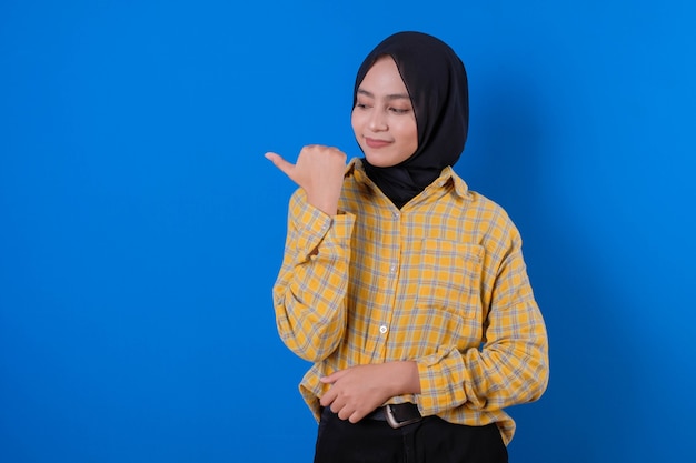 Pretty woman wearing yellow skirt and smile gesturing with hands