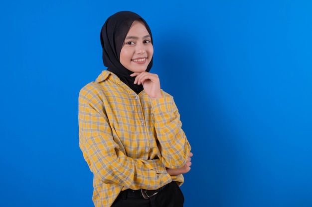 Pretty woman wearing yellow skirt and smiling expression