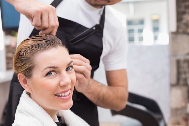 Pretty woman with her hair stylist