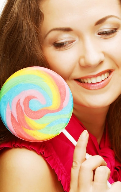 Pretty woman with lollipop