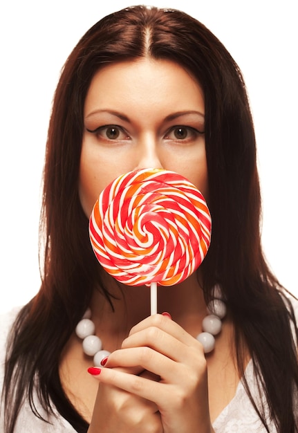 Pretty woman with lollipop