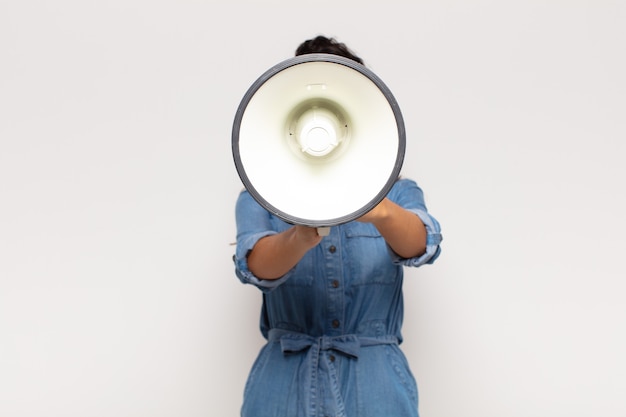 Pretty woman with a megaphone