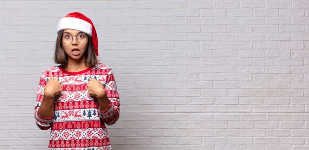 Pretty woman with santa hat