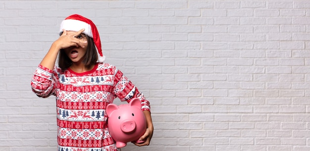 Pretty woman with santa hat