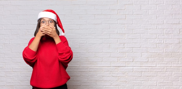 Pretty woman with santa hat