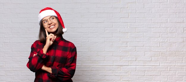 Pretty woman with santa hat