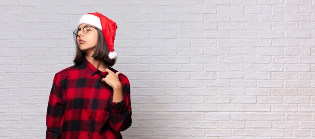 Pretty woman with santa hat