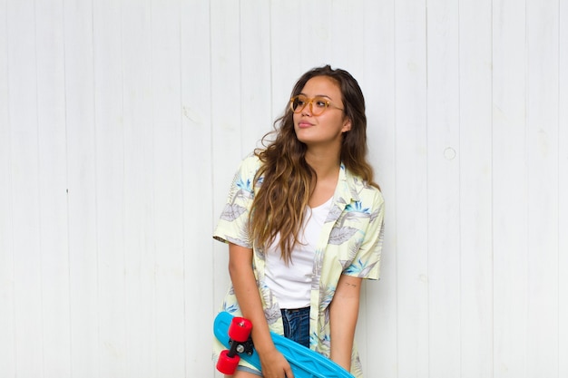 Pretty woman with a skateboard