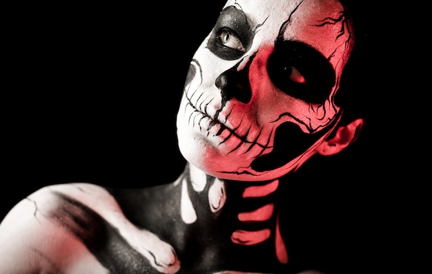 Pretty woman with skeleton body painting