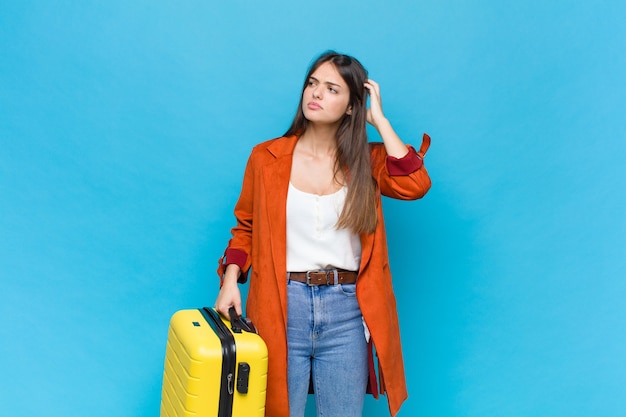 Pretty woman with a suitcase