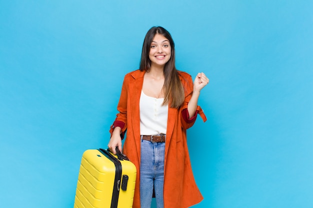 Pretty woman with a suitcase