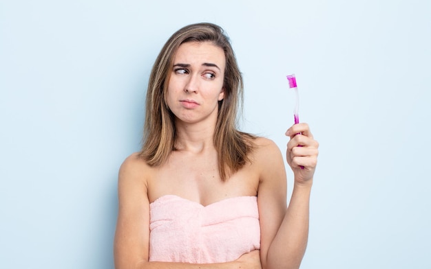 Pretty woman with a toothbrush.