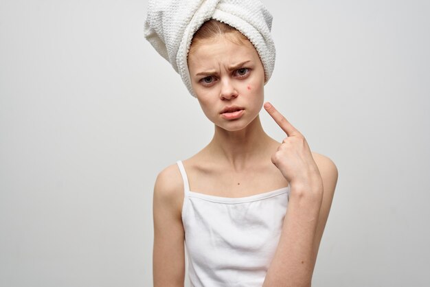 Pretty woman with a towel on my head cosmetology studio