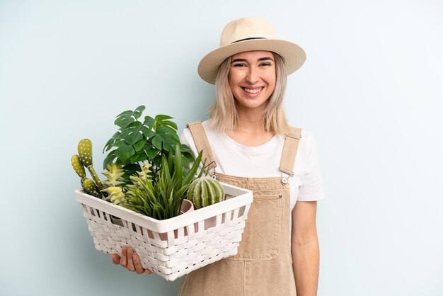 Pretty young adult woman gardering with plants