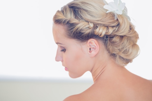 Pretty young bride looking down