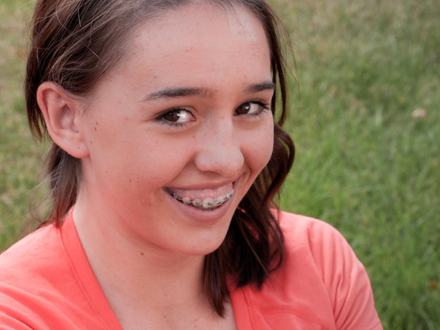 Pretty young girl in backyard.