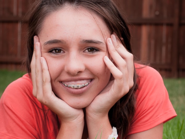 Pretty young girl in backyard.