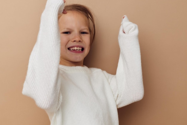 Pretty young girl childrens style emotions fun isolated background