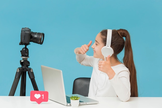 Pretty young girl happy to record video